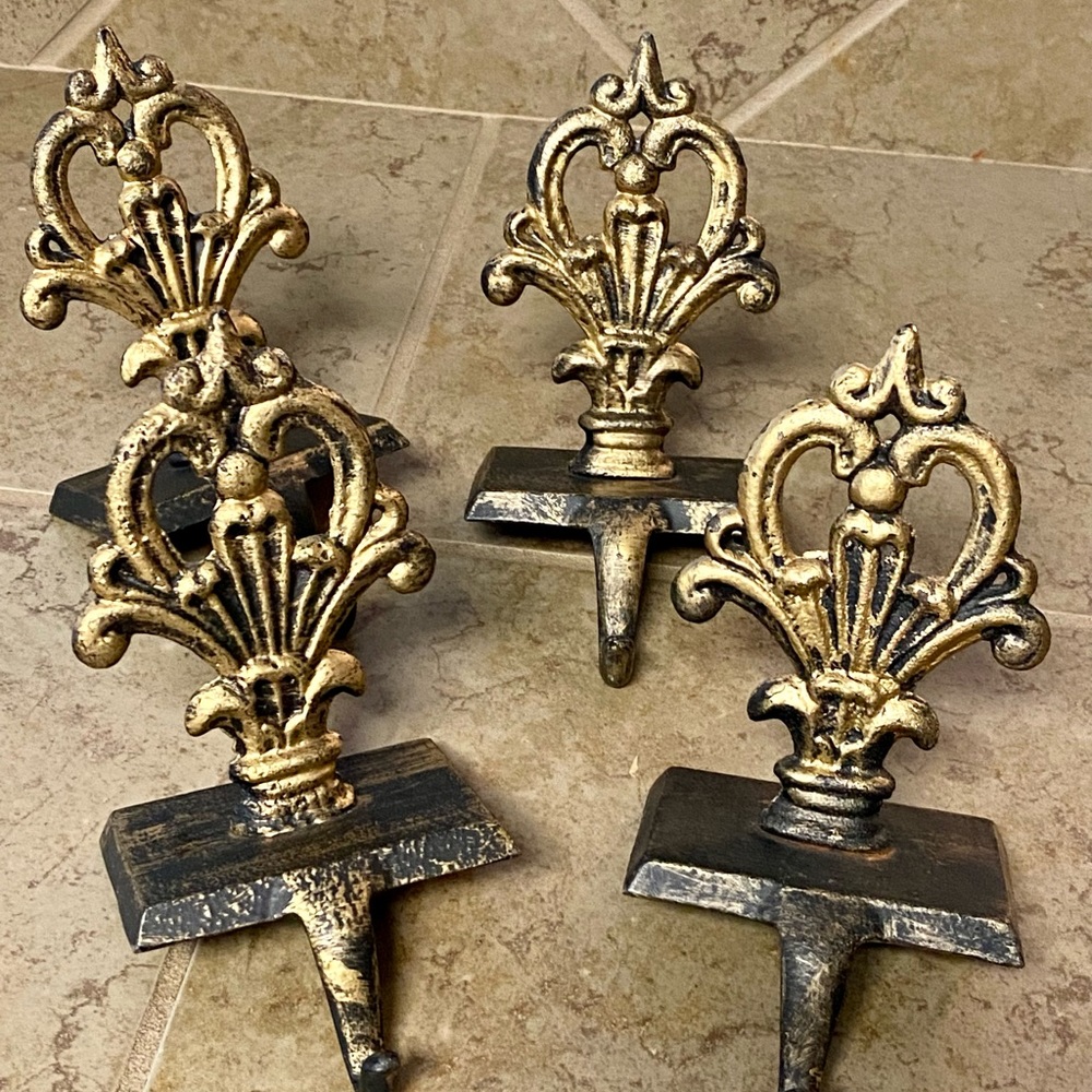 COPY - Set of four brass Christmas stocking holders. They are in like-new condi…